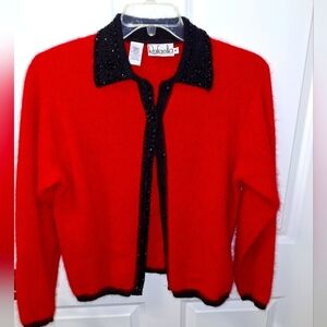 A Rafaella ladies red Angora, lambswool, and nylon blazer in a size medium.